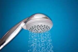 Shower head with tankless water heating